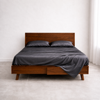 Luxury king size bed with breathable eucalyptus bedding in dark grey for cool and dry sleep comfort.