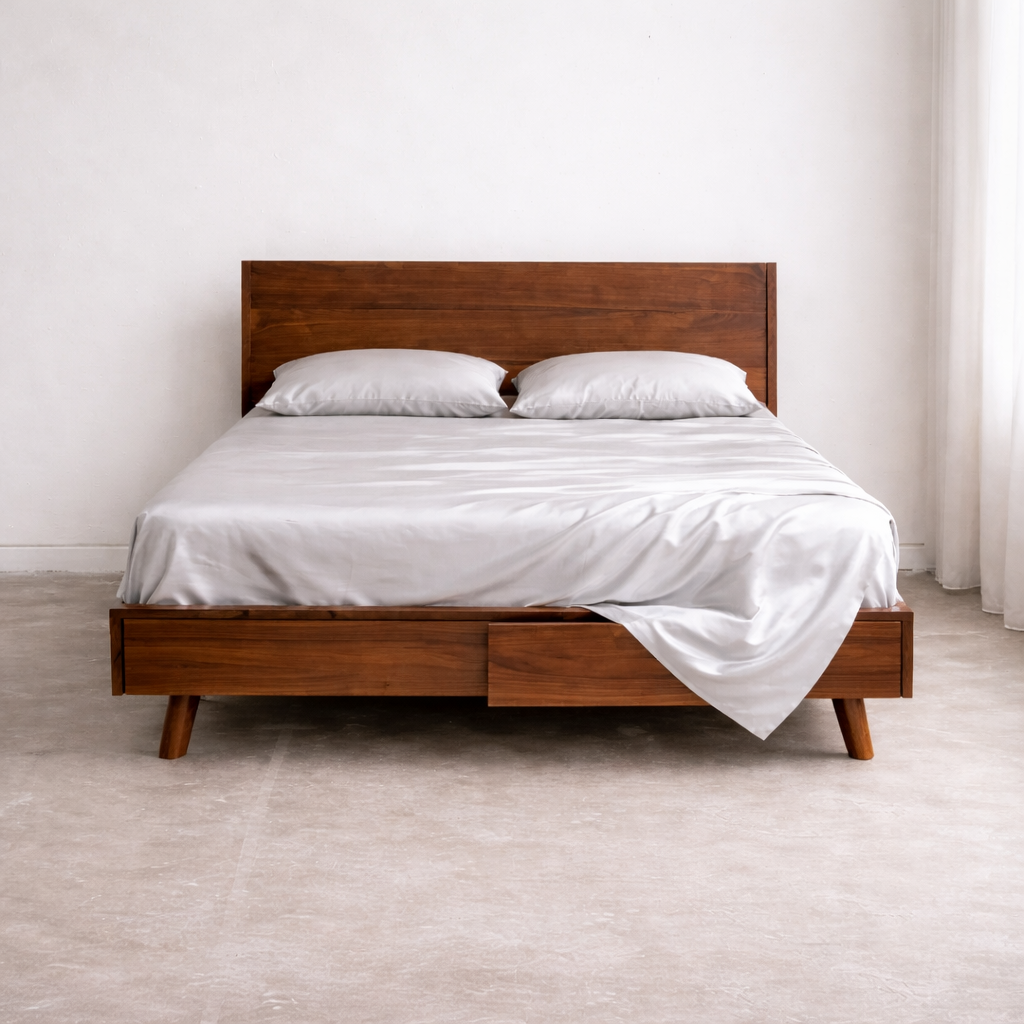 Luxury king size bed with breathable eucalyptus bedding in light grey for cool and dry sleep comfort.