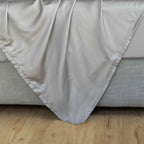 Silky-soft light grey eucalyptus sheets with breathable cooling comfort for menopause and warm nights.